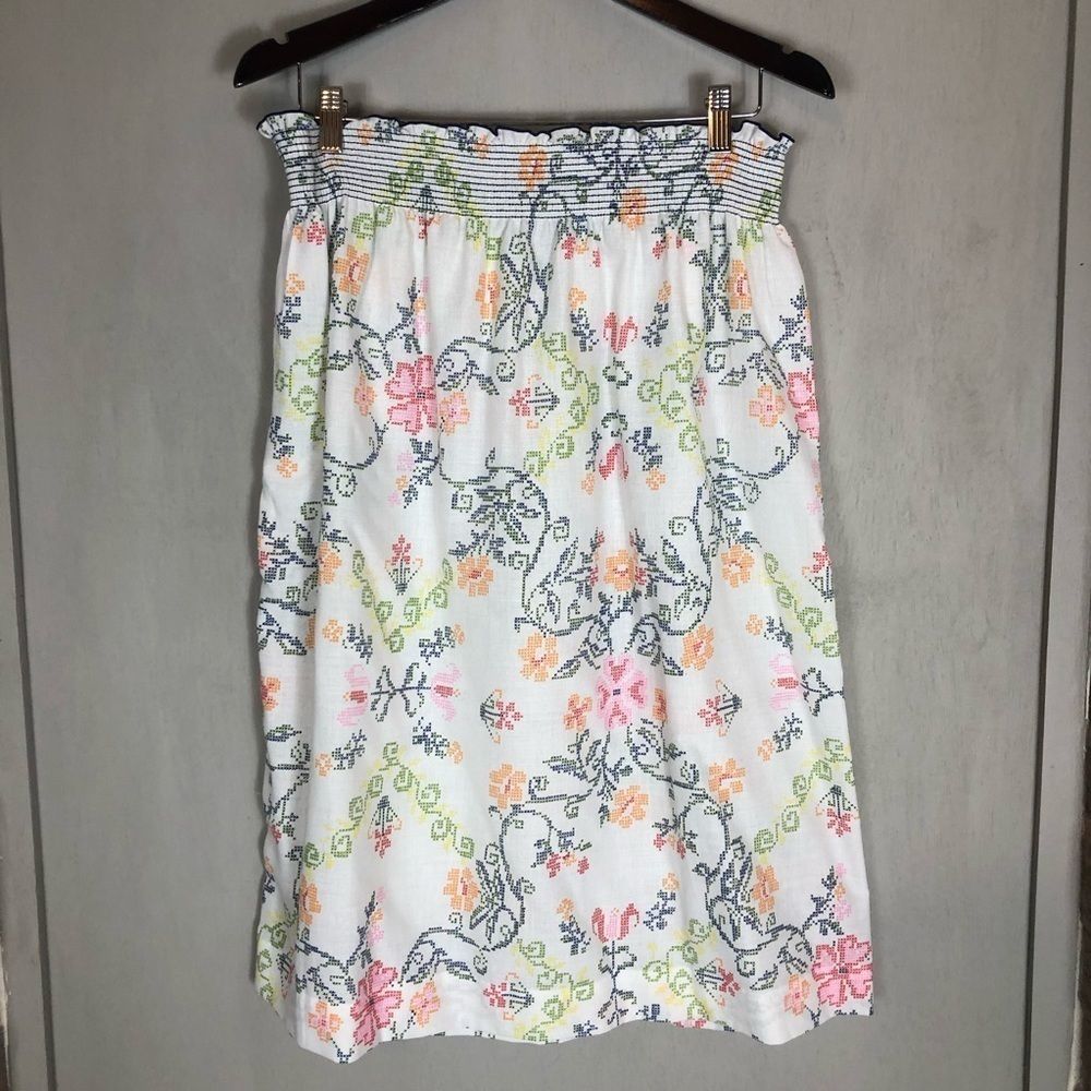 Handmade smocked skirt with counted cross-stitch